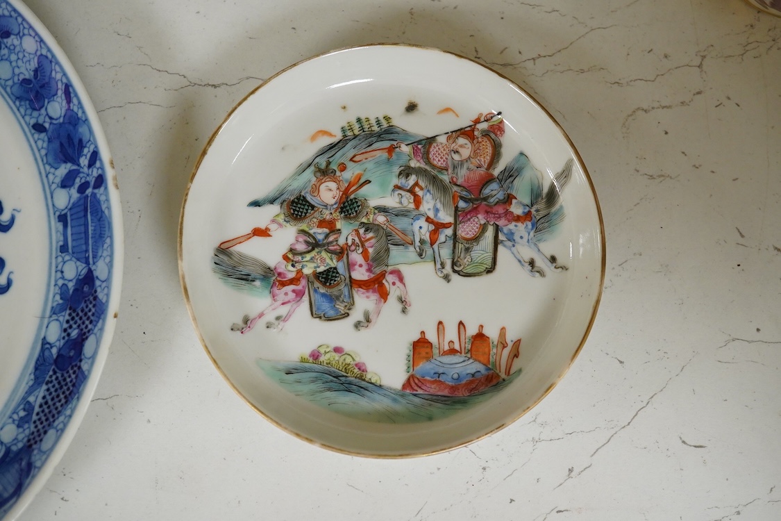 A 19th Century Chinese blue and white ‘precious objects’ plate, a jar and famille rose saucer, largest 23cm in diameter